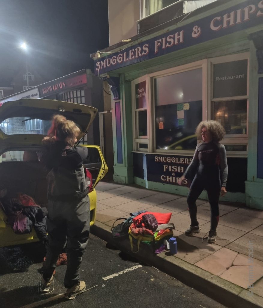 Seaweed gatherers at dawn, outside the Smugglers chippy © Emma Boden