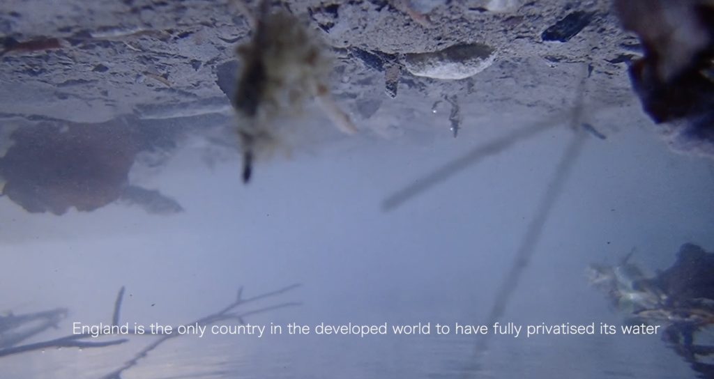 Film still from Ways of Water by Diana Scarborough showing underwater pollution at Nine Wells in Cambridge